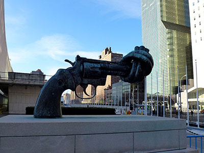 Non-Violence (Sculpture of Gun with Barrel Twisted). Wikimedia Commons: https://commons.wikimedia.org/wiki/File:Non-Violence_sculpture_in_front_of_UN_headquarters_NY.JPG